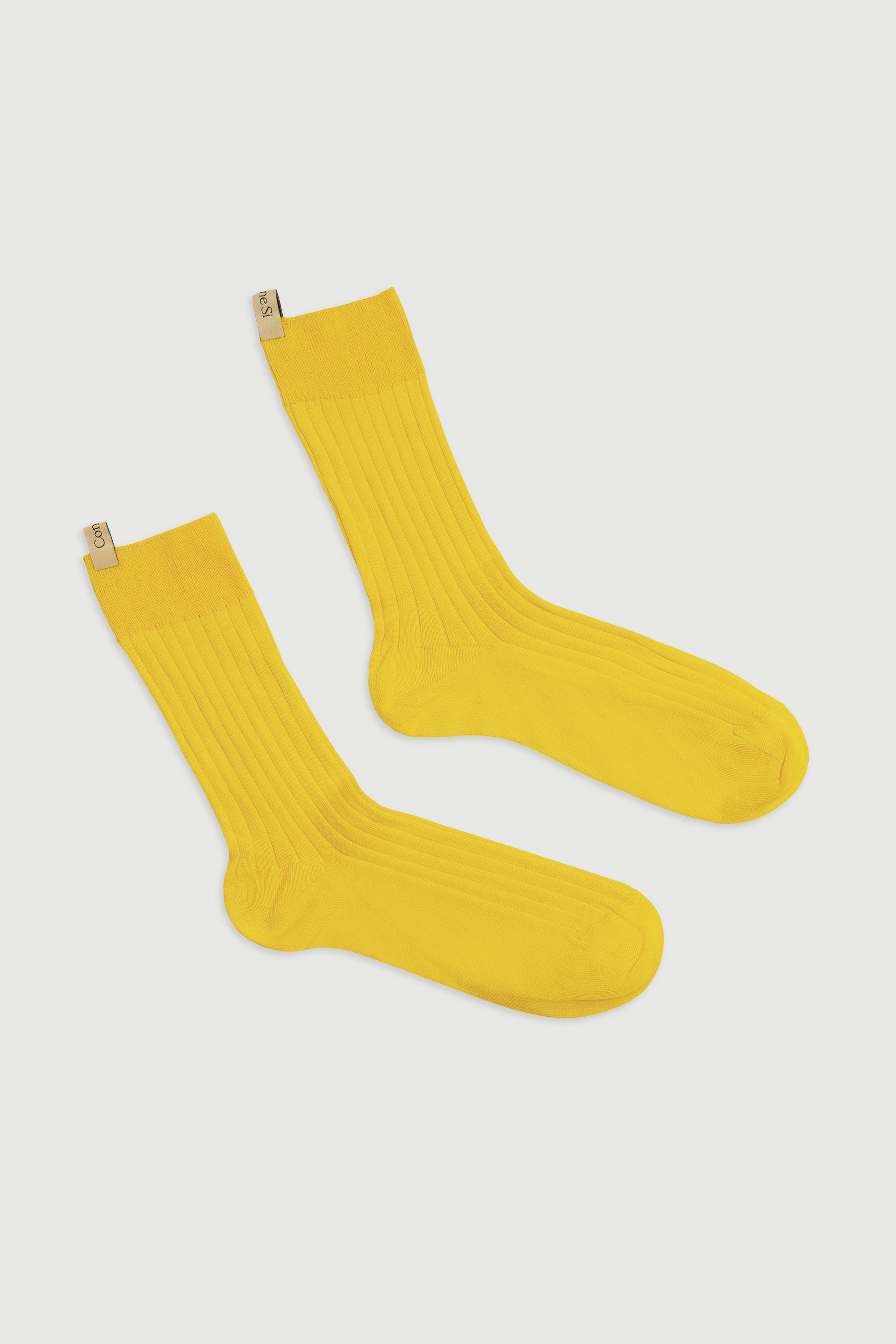 https://www.commesi.com/cdn/shop/products/yves-sock-canary_FL.jpg?v=1666722968&width=2048
